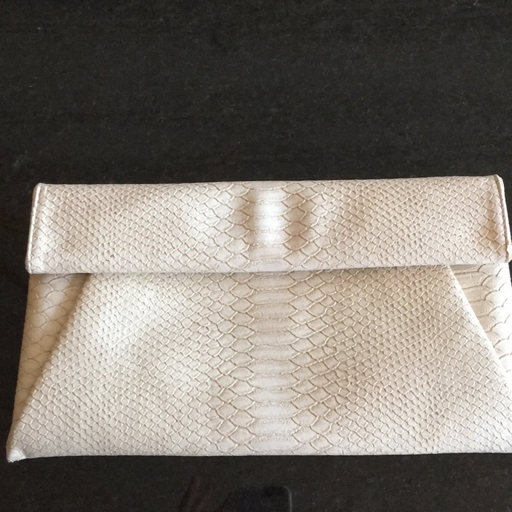 Tan snakeskin clutch